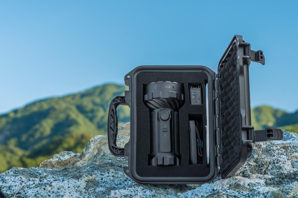 Olight Marauder 3 Black in protective carrying case outdoors