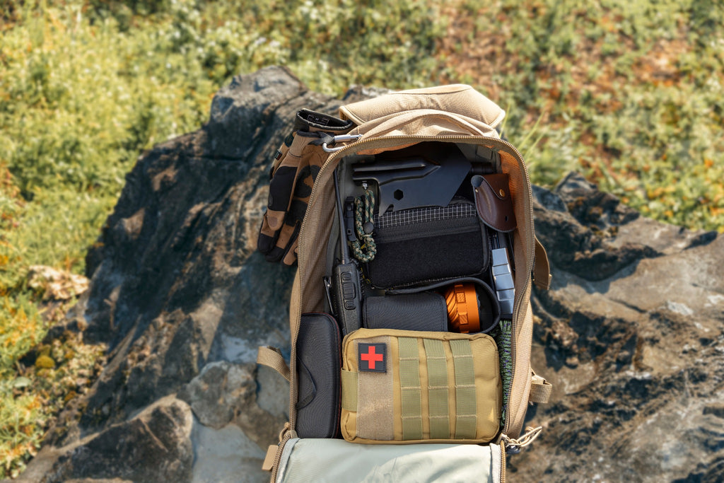 Olight Marauder 3 Orange packed with outdoor and emergency gear