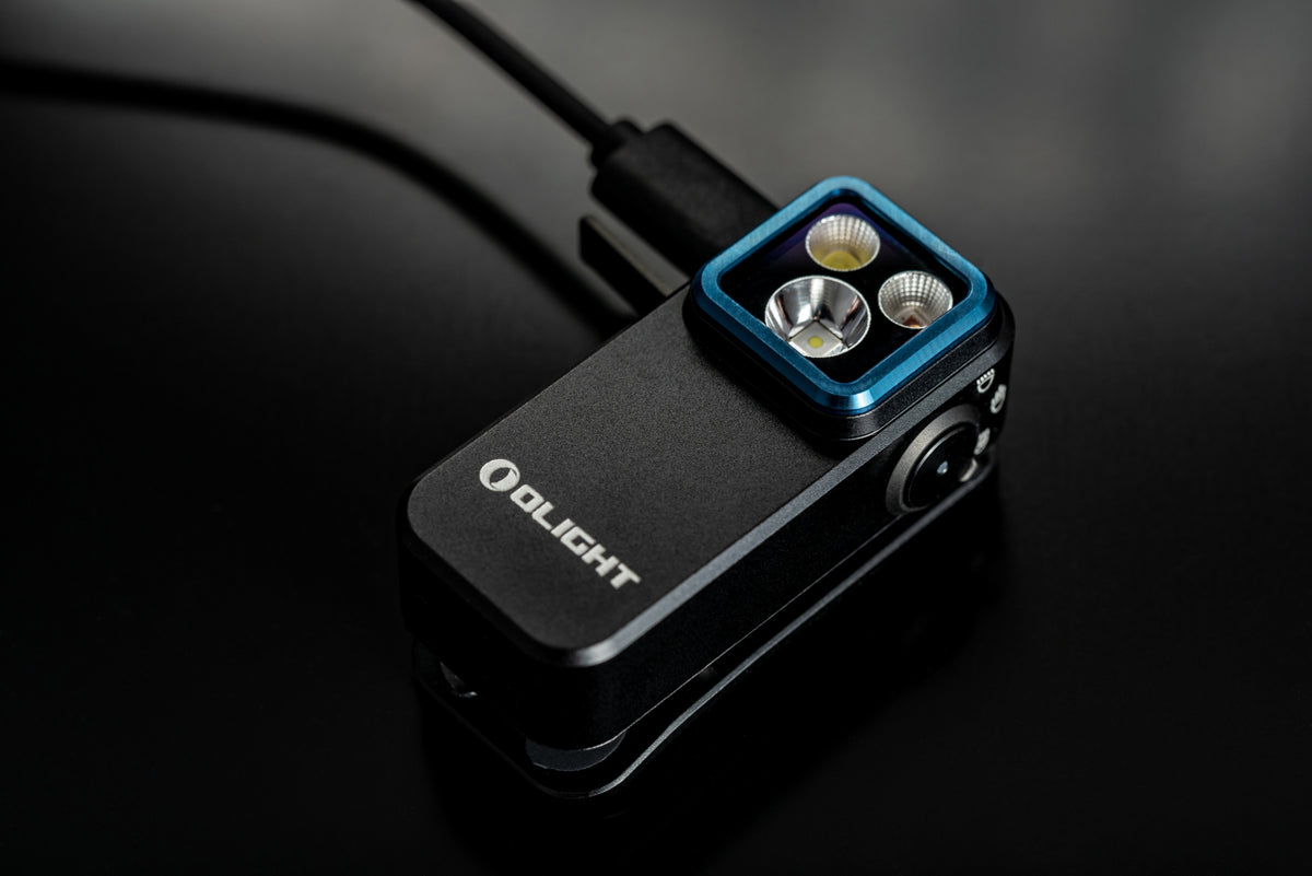 Olight Oclip 2 Pro Premium seated in the Mobile Charging Dock